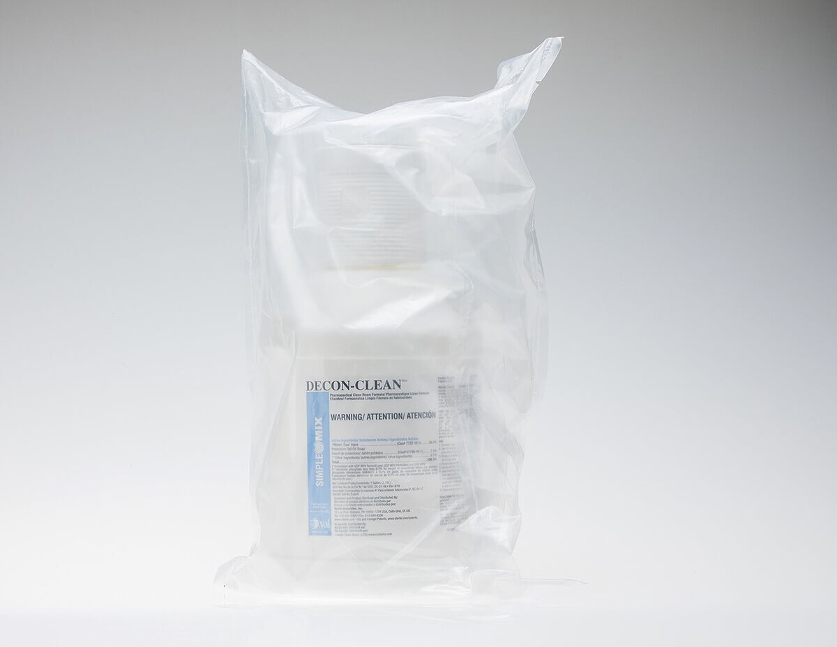 Sterile-bagged DECON-CLEAN 1-gallon bottle sealed inside clear overwrap.
