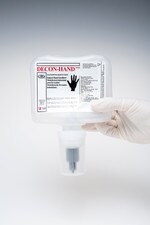 DECON-HAND ASEPTI-CLEANSE ethanol-based sanitizer refill pouch with attached dispensing nozzle, held upright for product visibility.