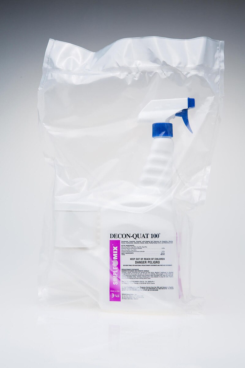 Sterile-bagged Decon-Quat 100, 16oz SimpleMix trigger spray bottle sealed inside a transparent overwrap bag, upright.