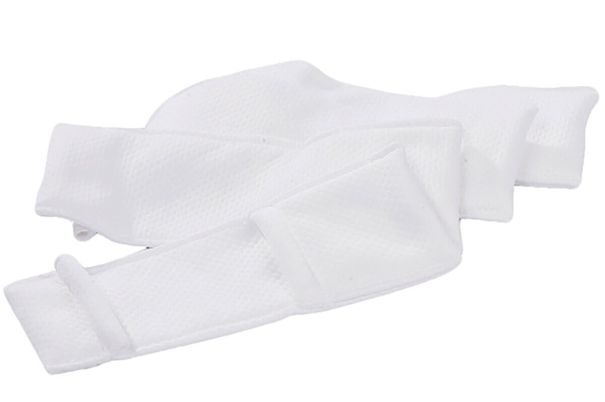 Stack of EasyReach bound-edge poly mop pads displayed together to show thickness and uniform construction.