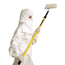 Worker in full cleanroom protective suit using a yellow extension pole with the 8-16 -inch tacky roller to clean overhead surfaces.
