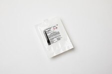 Single pouch of sterile ALCOH-WIPE pre-saturated 70% IPA wipe, sealed in white poly packaging with labeled hazard warnings.